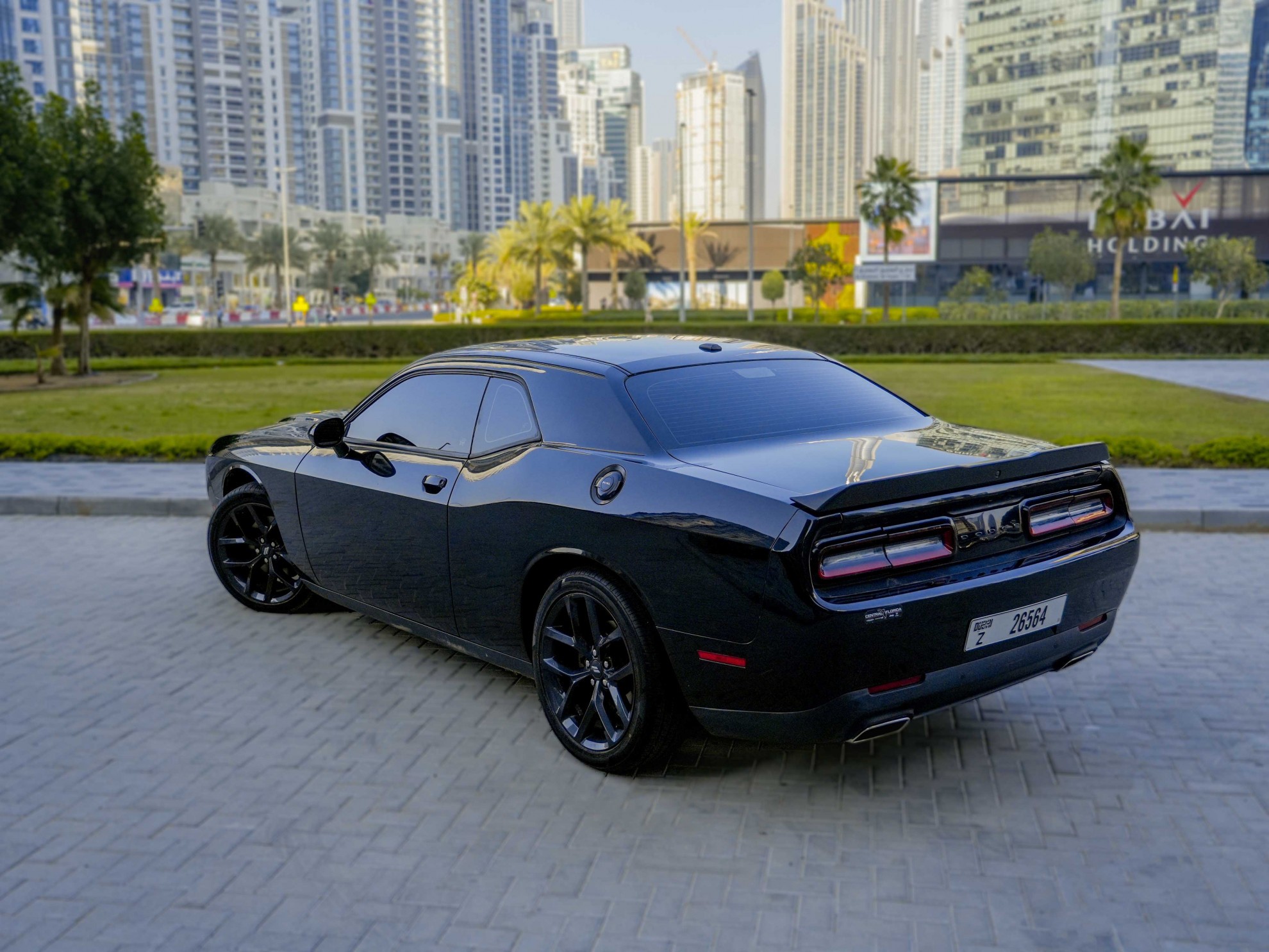 https://dev.quickdrive.ae/uploads/2023/02/01/Dodge Challenger V6 2021 (2).jpg